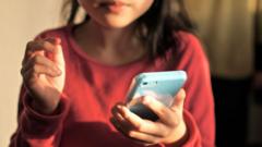 'Argument won' on smartphones in schools, minister says