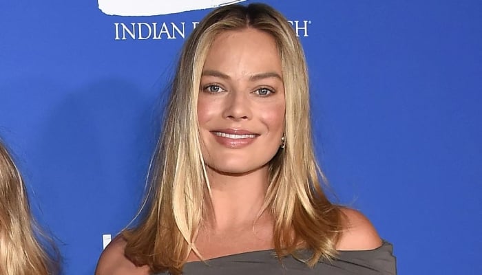 Pregnant Margot Robbie glows in new campaign 